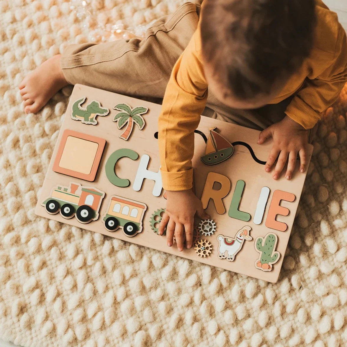 Child playing with personalised name puzzle with custom design