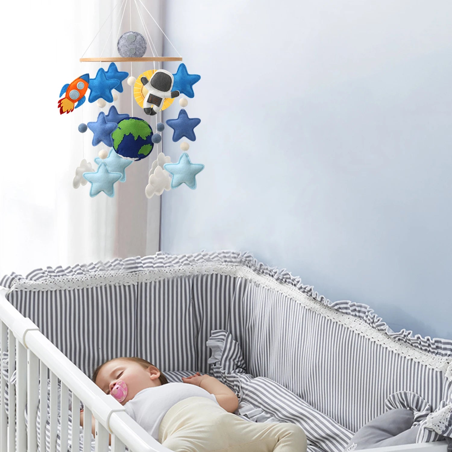 Outer Space Adventure Astronaut &amp; Rocket Nursery Mobile hanging in cute nursery