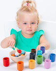 toddler playing with Montessori Wooden Balls in Cups Sorter - Rainbow Colour Sorting Game