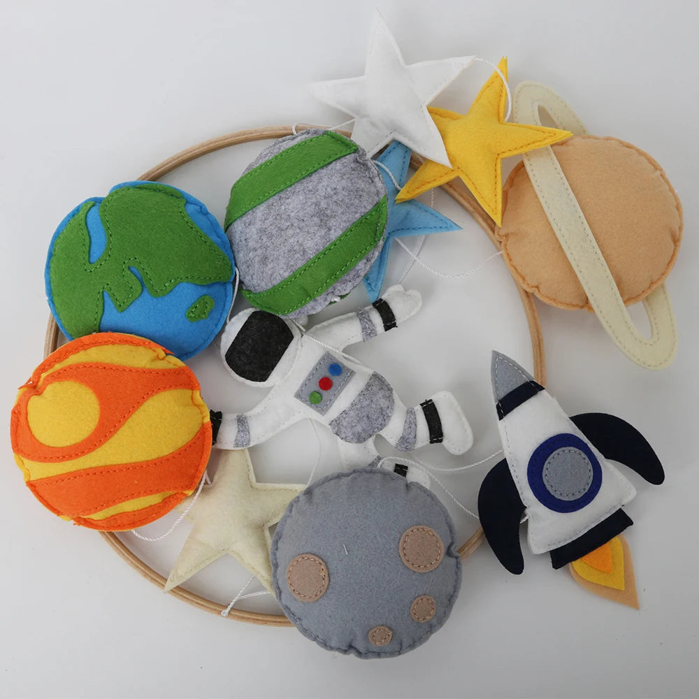 Space Nursery Mobile | Solar System Baby Crib Mobile with Felt Astronaut & Spaceship | Perfect Baby Shower Gift flat lay