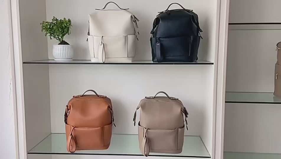 Video dispalying Vegan Leather Nappy Backpack: Style Meets Sustainability Buy now baby stork store