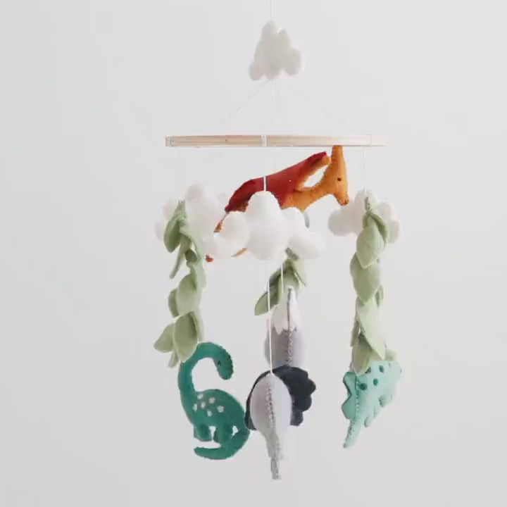 Video showcasing Premium Dinosaur Felt Baby Mobile | Jurassic Nursery Hanging Decor 